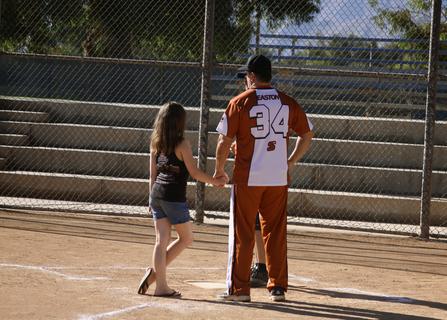 Alliance Coach Del Pickney Takes the Coin Toss With His Daughter in 2010